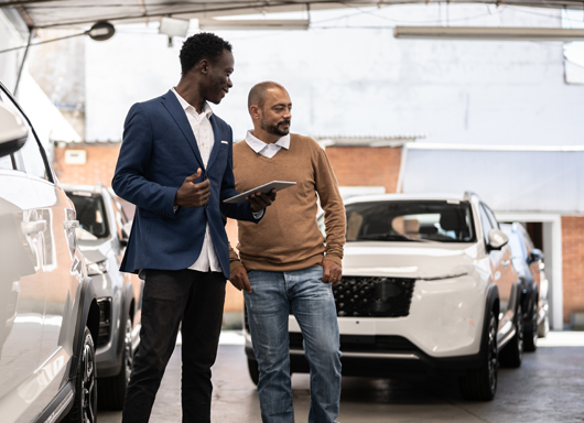 Salesperson with customer in showroom